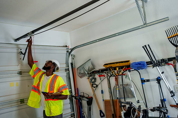 Professional Garage Door Panel Replacement technician working in Pushmataha County County, OK